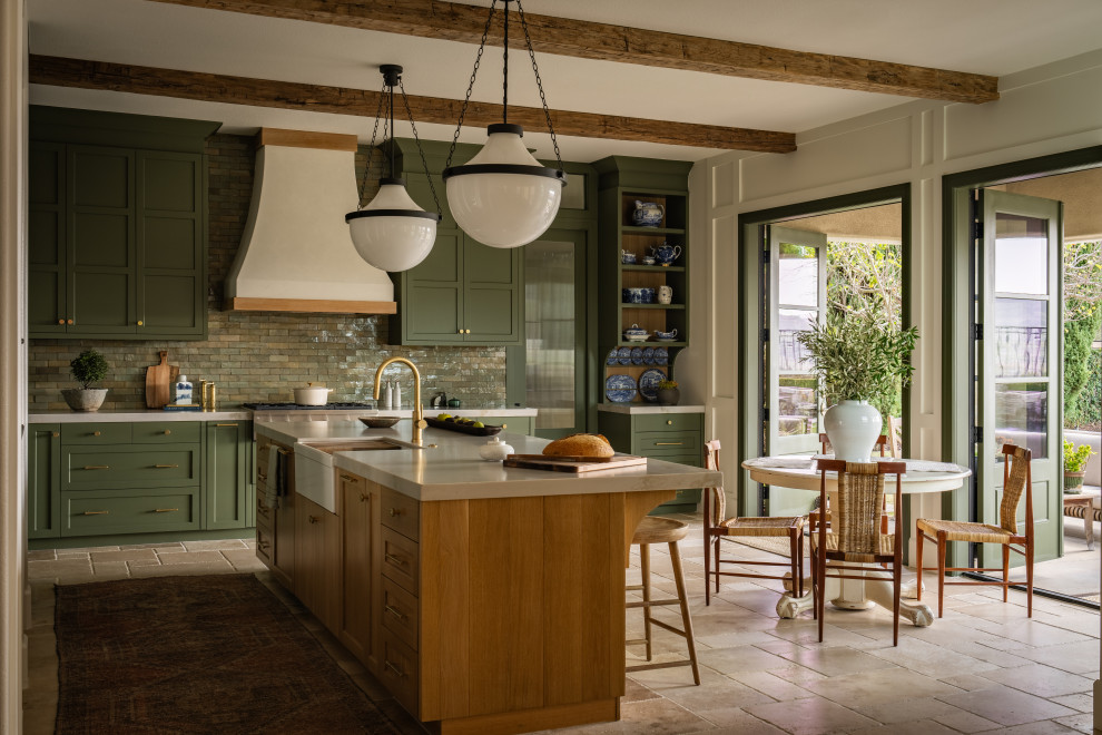 Open concept kitchen - transitional exposed beam open concept kitchen idea in Orange County with recessed-panel cabinets, green cabinets, ceramic backsplash, stainless steel appliances and an island