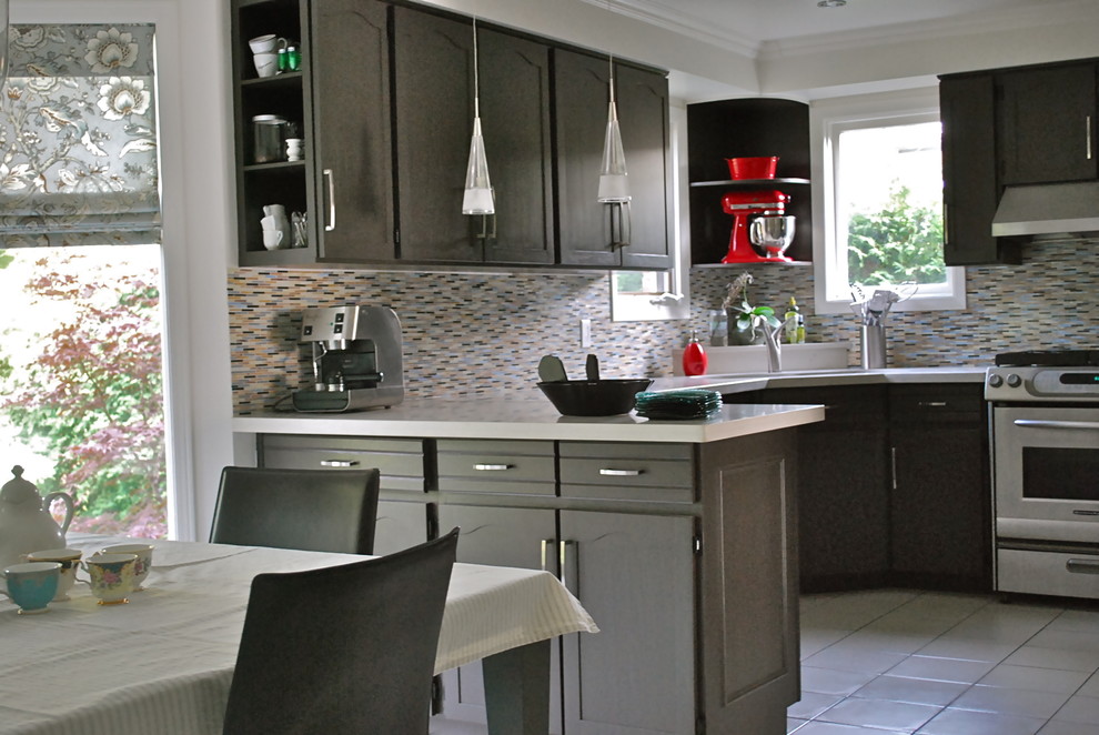 Example of a trendy kitchen design in Toronto with stainless steel appliances, black cabinets, multicolored backsplash, matchstick tile backsplash and recessed-panel cabinets