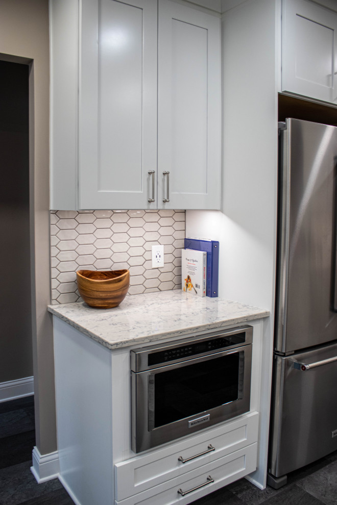 Grey and White Shaker Kitchen with Quartz Countertops and Picket-Style ...
