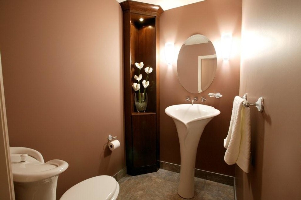 Design ideas for a traditional powder room in Calgary with a pedestal sink.