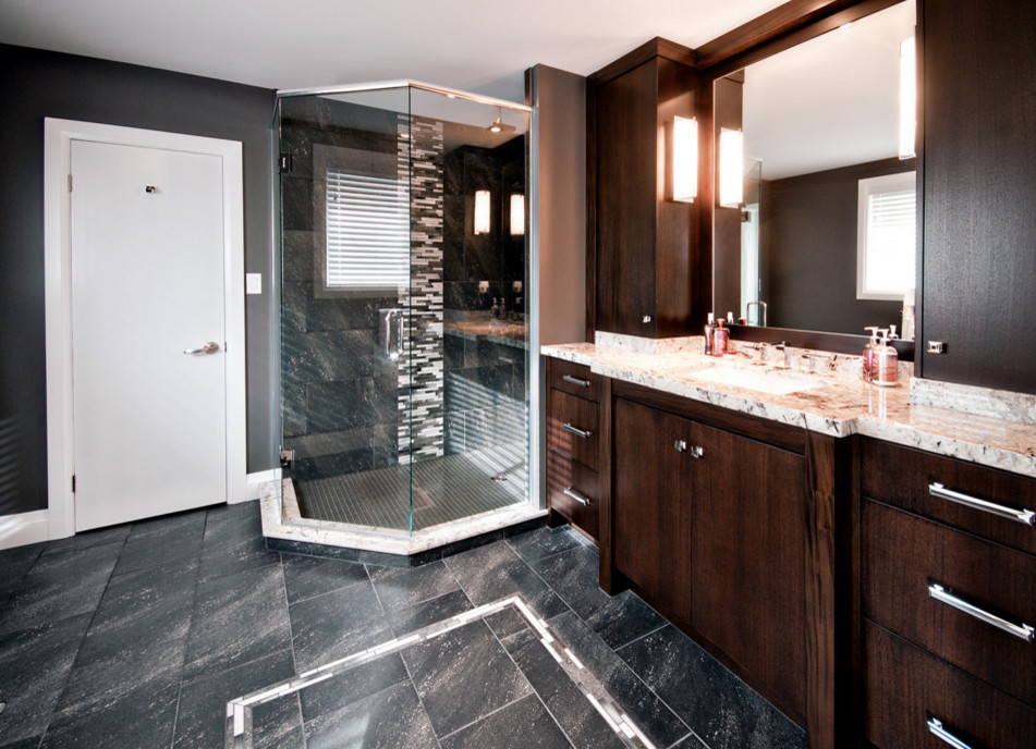 Large transitional master porcelain tile and black floor corner shower photo in Toronto with flat-panel cabinets, dark wood cabinets, gray walls, an undermount sink and a hinged shower door