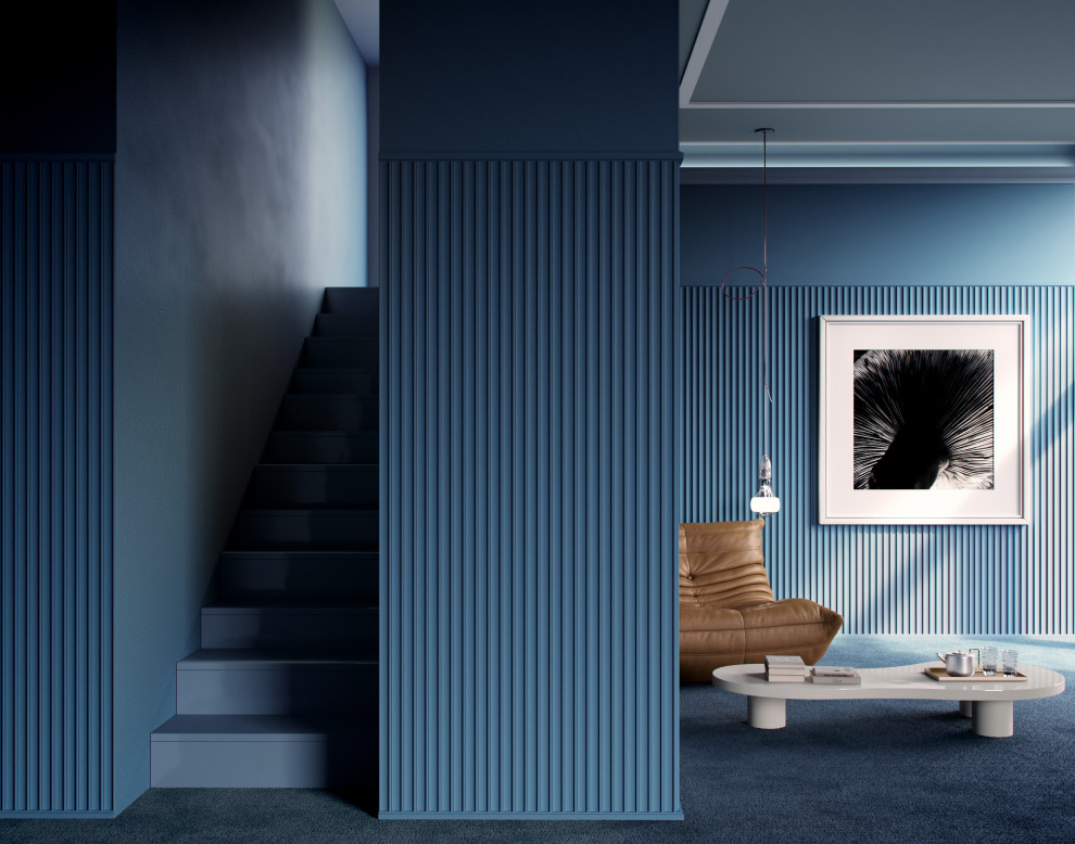 На фото: прихожая в современном стиле с синими стенами, ковровым покрытием, синим полом и панелями на части стены с