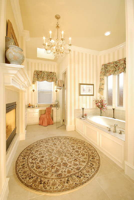 Inspiration for a large transitional master bathroom in Dallas with raised-panel cabinets, white cabinets, granite benchtops, an alcove tub and beige tile.