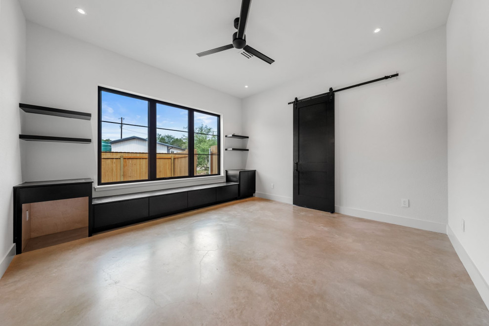Transitional bedroom photo in Austin