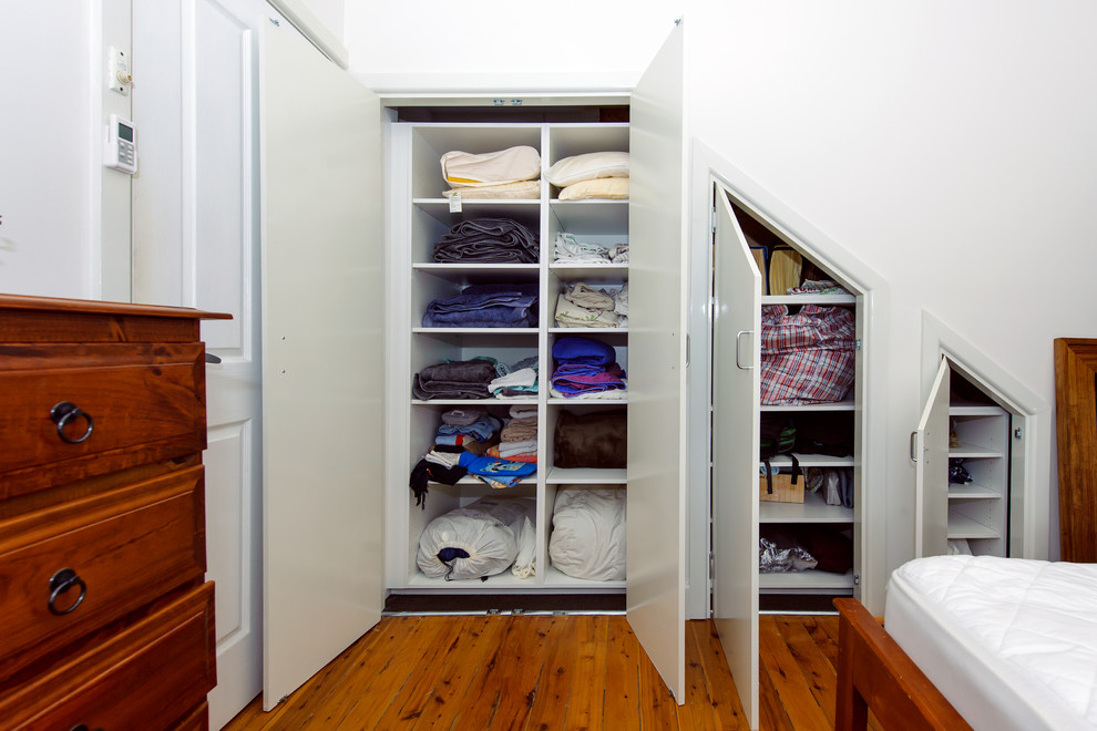 Photo of a traditional storage and wardrobe in Sydney.