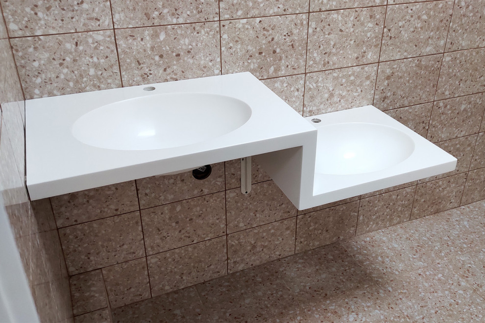 Inspiration for a small contemporary bathroom in Saint Petersburg with an integrated sink, solid surface benchtops, white benchtops and a double vanity.