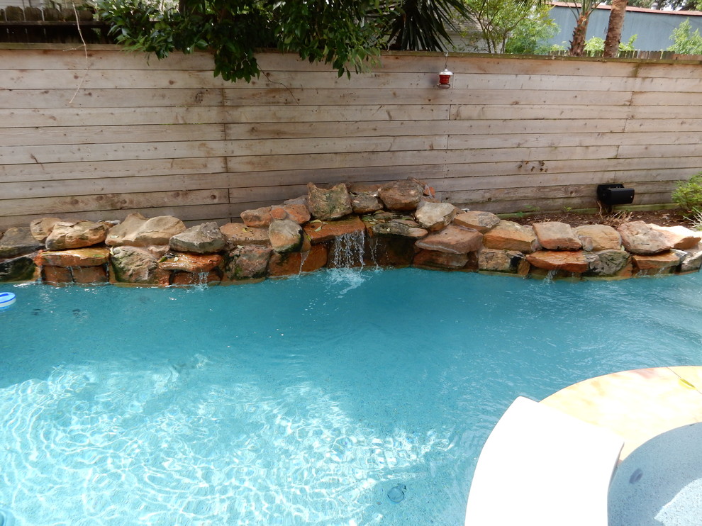 Inspiration for a rustic pool remodel in Houston