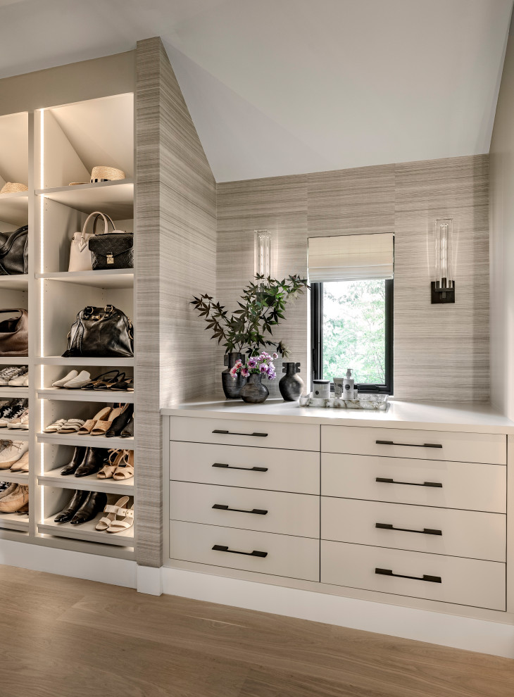 Inspiration for a large contemporary closet remodel in Boston