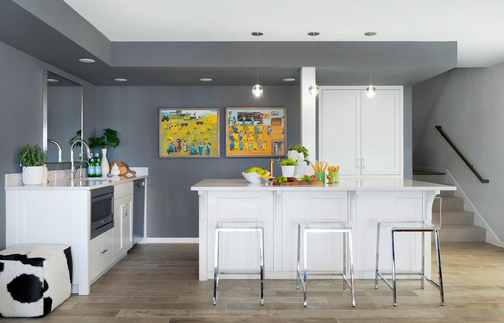 Transitional beige floor and ceramic tile kitchen photo in Minneapolis with an undermount sink, shaker cabinets, white cabinets, white countertops and quartz countertops