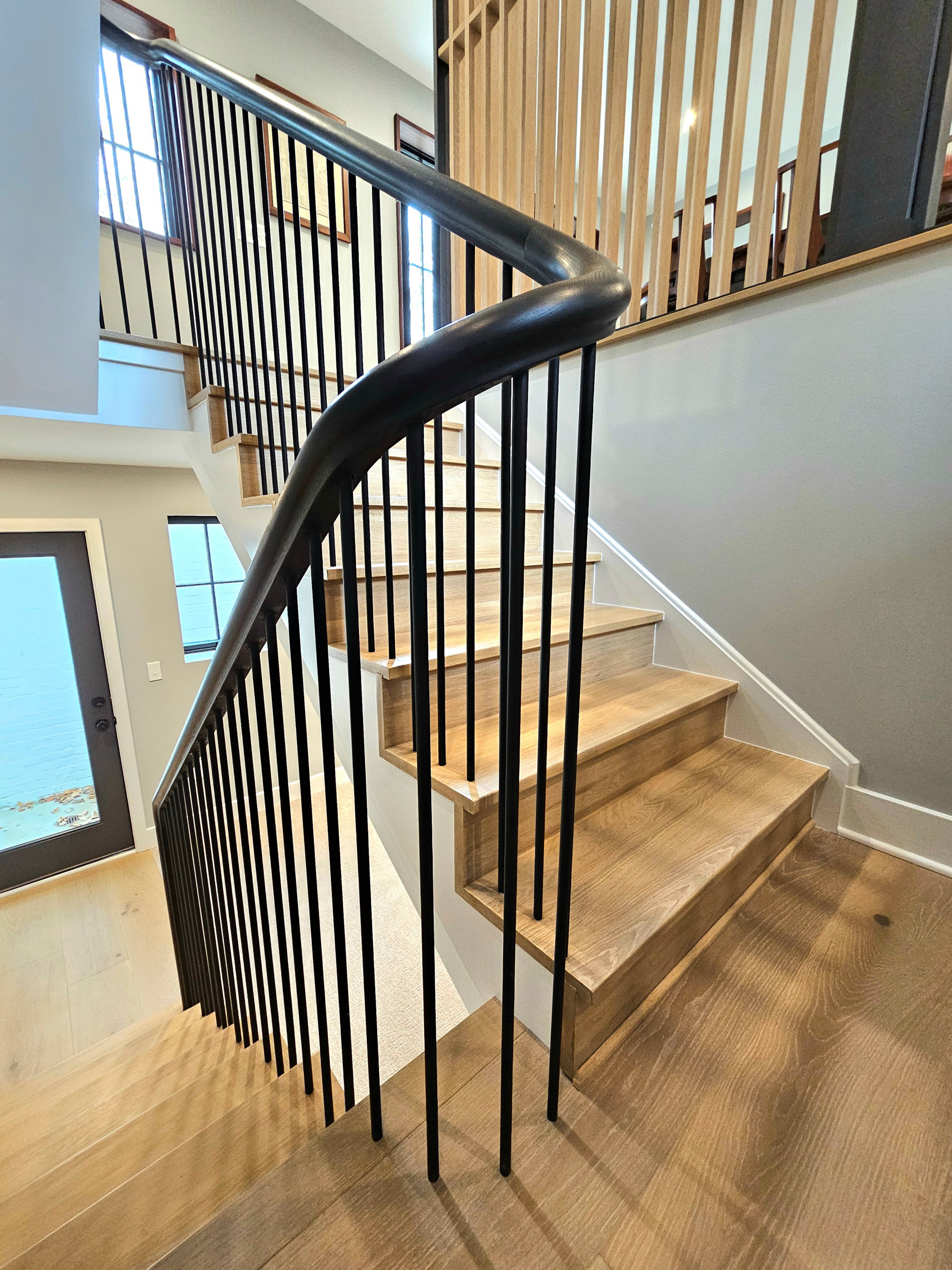 115_Stunning Continuous Rail System on 3 Story Floating Stairs; Arlington, VA 22