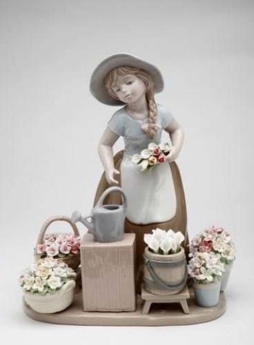 Girl in Brown Dress and White Apron with Flower Baskets Figurine