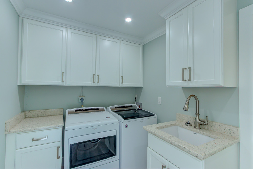 Example of a small transitional l-shaped home design design with an undermount sink, shaker cabinets, white cabinets, recycled glass countertops, a side-by-side washer/dryer and beige countertops