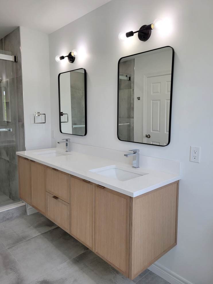 Modern master bathroom in Other with light wood cabinets, porcelain floors, an undermount sink, quartzite benchtops, grey floor, white benchtops, a double vanity and a floating vanity.
