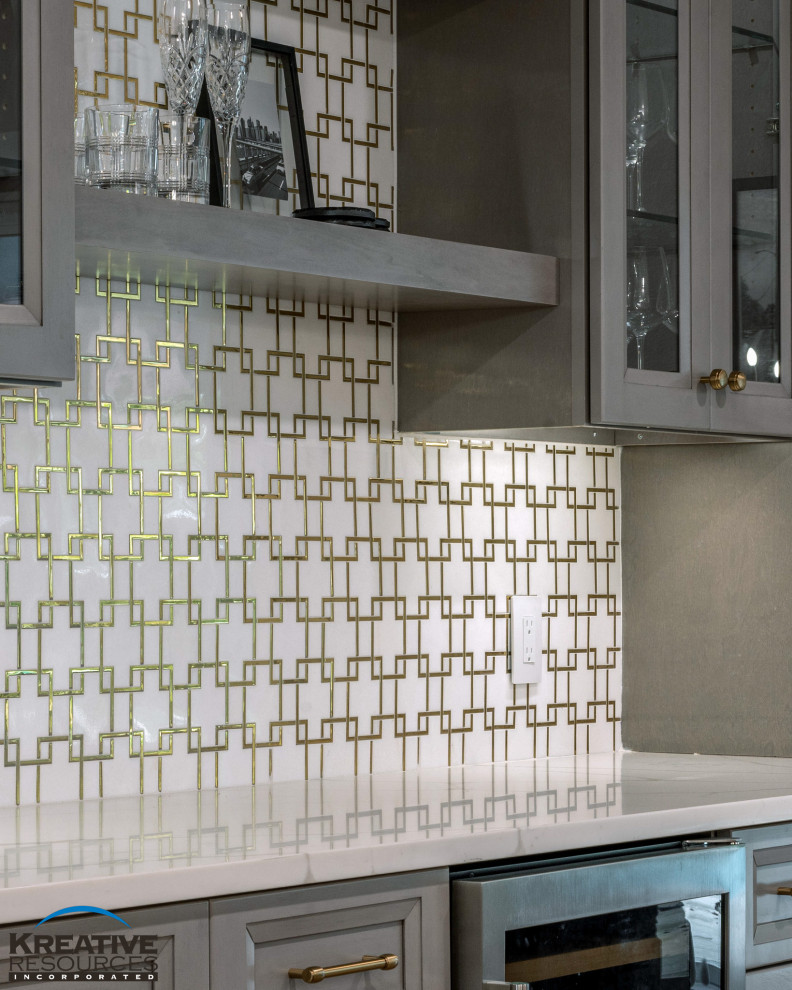 Inspiration for a large transitional l-shaped porcelain tile and brown floor eat-in kitchen remodel in Orlando with an undermount sink, shaker cabinets, quartzite countertops, beige backsplash, porcelain backsplash, stainless steel appliances, an island and white countertops