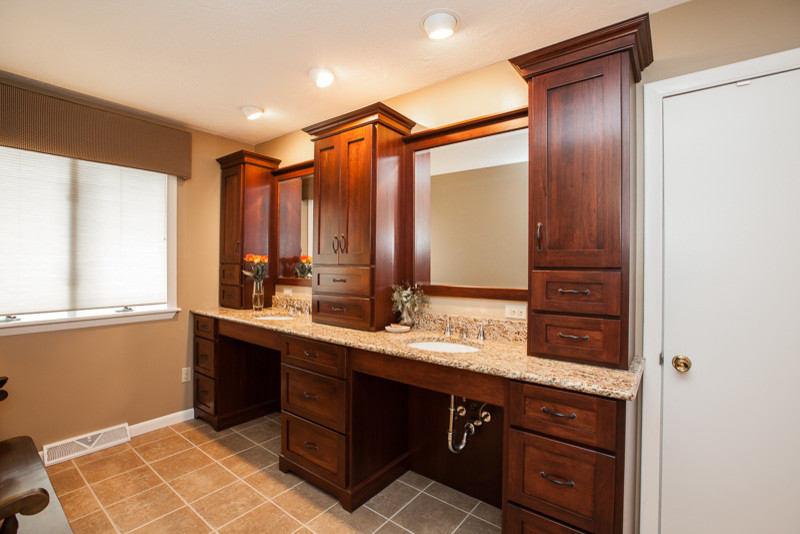 Expansive traditional master bathroom in Other with an undermount sink, shaker cabinets, medium wood cabinets, granite benchtops, beige tile, ceramic tile, an alcove shower, a two-piece toilet, beige walls and travertine floors.
