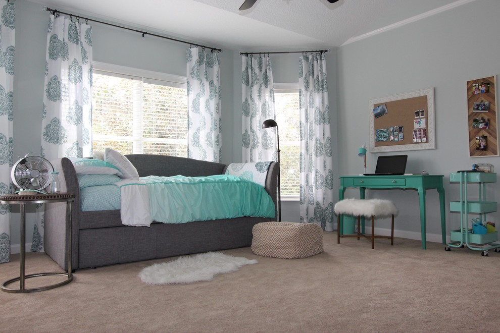 Photo of a mid-sized transitional kids' room for girls in Orlando with grey walls, carpet and beige floor.