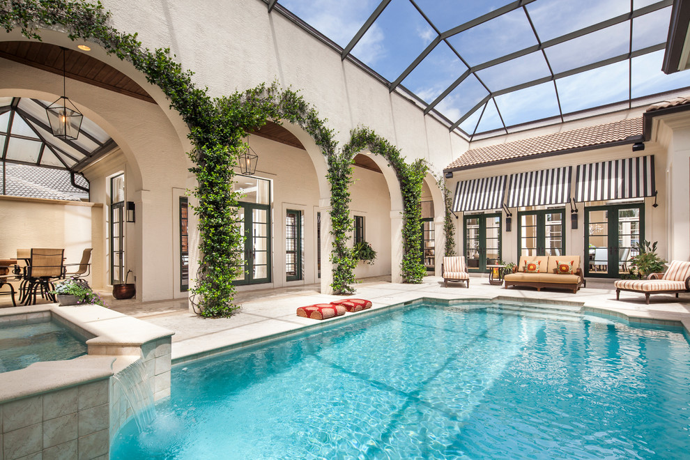 Design ideas for a tropical custom-shaped pool in Miami.