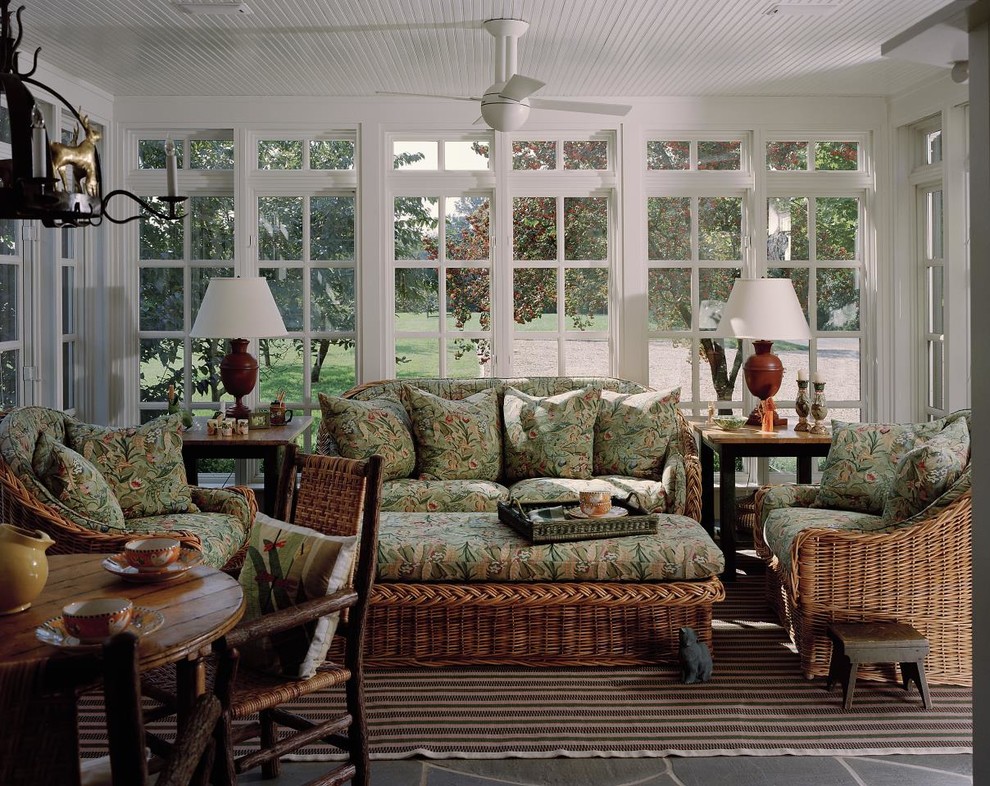 This is an example of a mid-sized traditional sunroom in DC Metro with slate floors, no fireplace, a standard ceiling and grey floor.