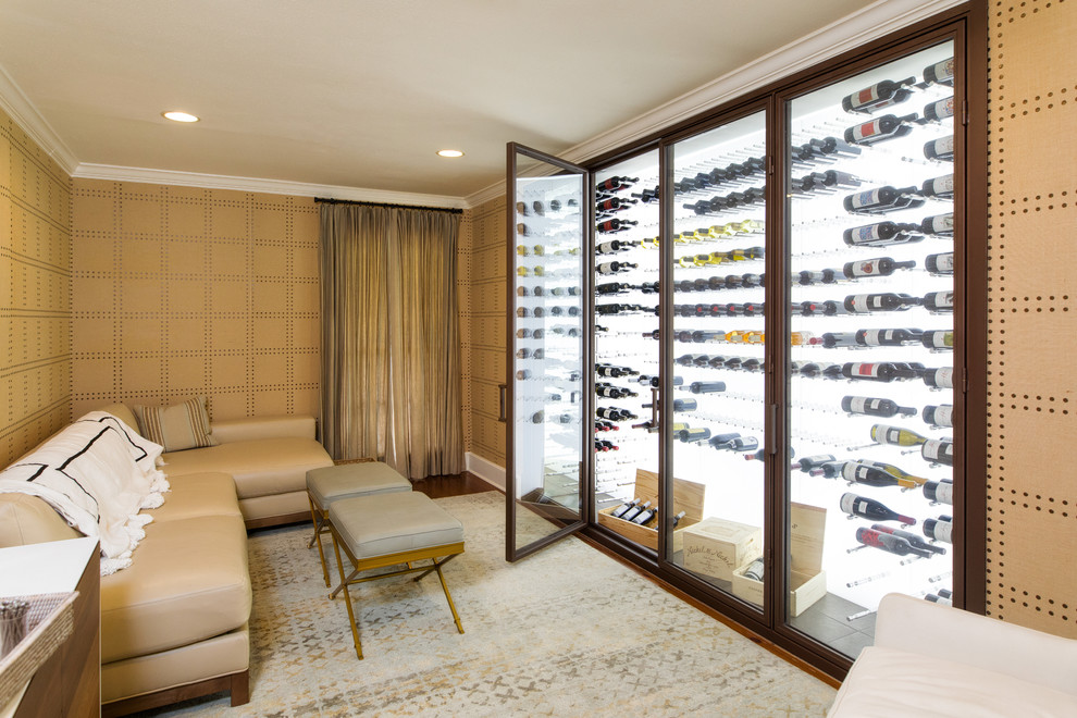 Transitional wine cellar in New Orleans with storage racks.