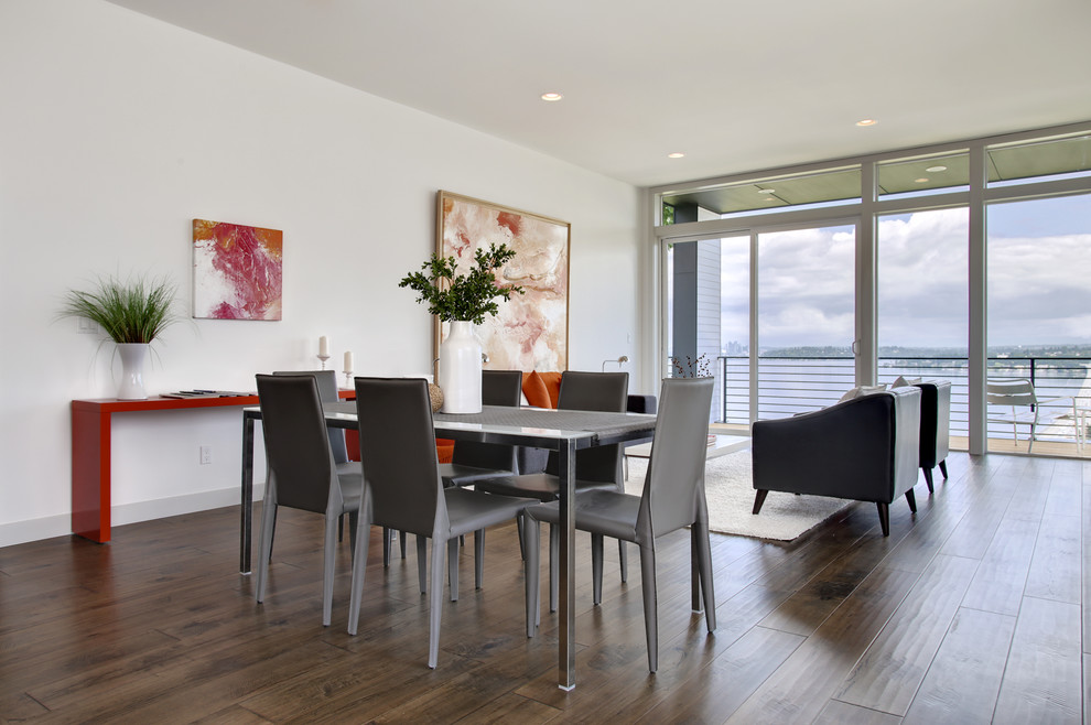 Example of a minimalist dining room design in Seattle