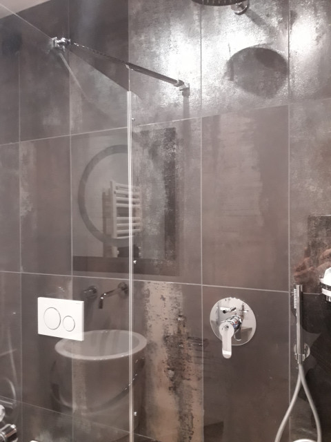 Da un bicamere a un appartamento su due livelli - Progetto in corso contemporary-powder-room