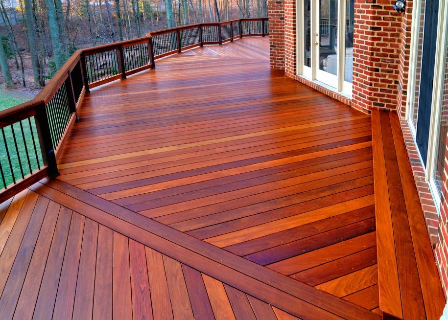 Example of a huge mountain style backyard deck design in DC Metro with no cover