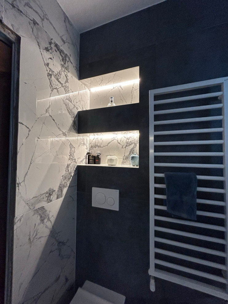 This is an example of a small contemporary 3/4 bathroom in Rome with flat-panel cabinets, dark wood cabinets, a curbless shower, a wall-mount toilet, multi-coloured tile, porcelain tile, white walls, porcelain floors, a console sink, wood benchtops, multi-coloured floor, an open shower, a niche, a single vanity, a floating vanity, recessed and panelled walls.
