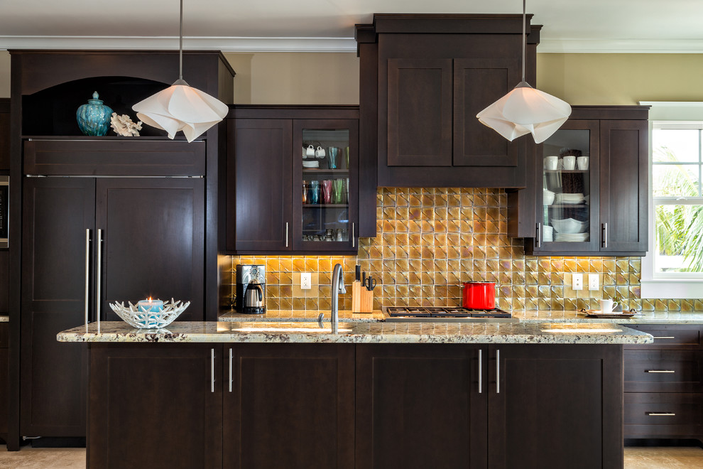 This is an example of a transitional kitchen in Miami with yellow splashback.