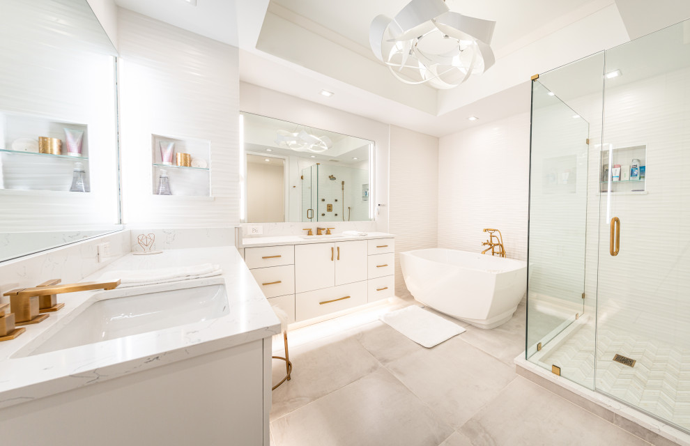 Inspiration for a contemporary master bathroom in Tampa with flat-panel cabinets, white cabinets, white walls, an undermount sink, grey floor, a hinged shower door and multi-coloured benchtops.