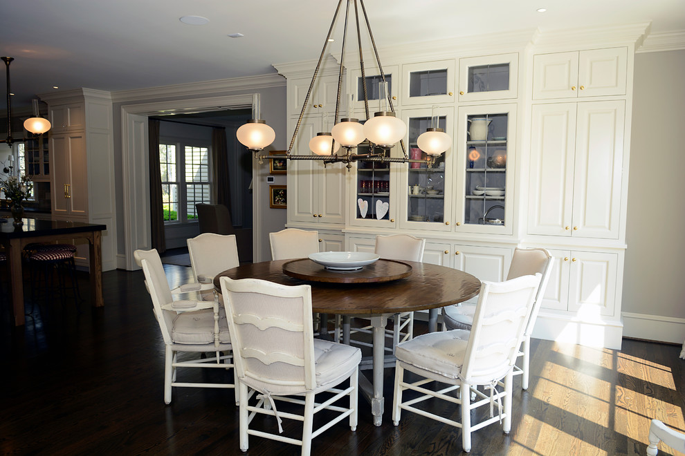 This is an example of a mid-sized traditional kitchen/dining combo in Atlanta with grey walls and medium hardwood floors.