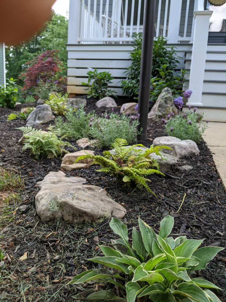 Large asian front yard garden in Other with with rock feature.