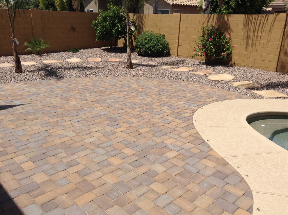 Photo of a small rustic full sun courtyard concrete paver outdoor basketball/tennis/multi-game court in Phoenix for spring.