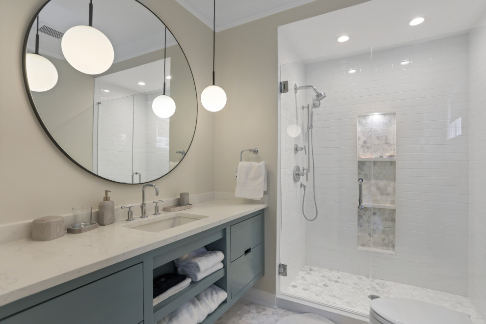 This is an example of a mid-sized contemporary 3/4 bathroom in Atlanta with flat-panel cabinets, turquoise cabinets, an open shower, white tile, subway tile, beige walls, ceramic floors, granite benchtops, white floor, a hinged shower door, white benchtops and an undermount sink.