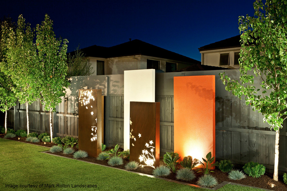 Mid-sized modern home design in Melbourne.