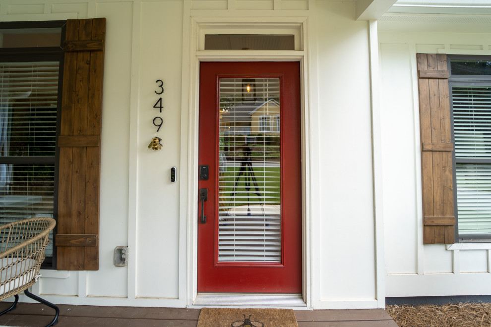 Small rural front door in Atlanta with a single front door and a red front door.