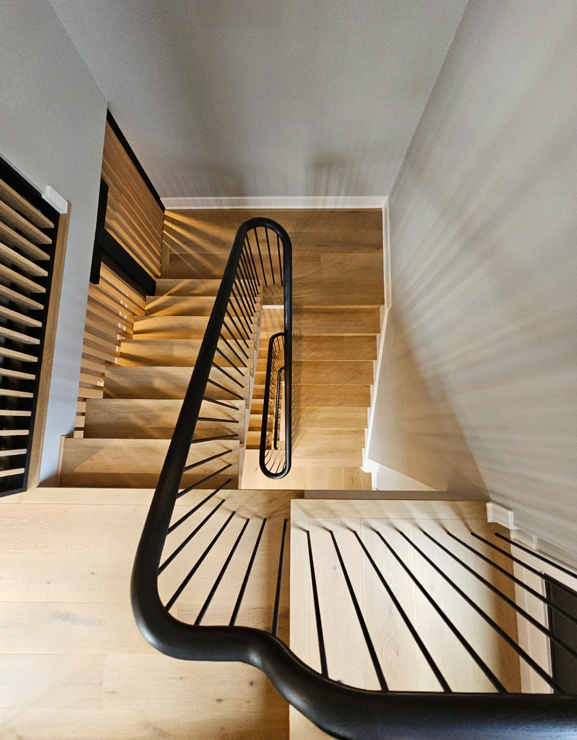 115_Stunning Continuous Rail System on 3 Story Floating Stairs; Arlington, VA 22