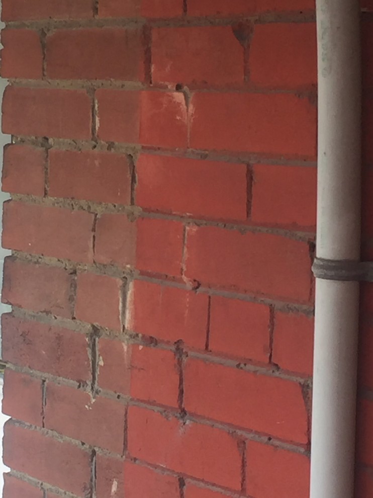 Remove paint from exterior brick?