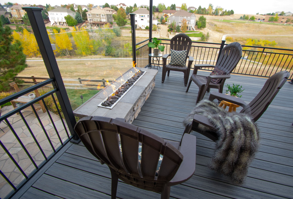 Medium sized contemporary back first floor metal railing terrace in Denver with a fire feature and no cover.