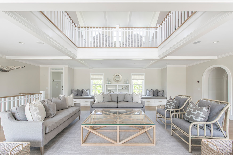 Lower Cliff Rd. - Example of a huge beach style open concept living room design in Boston with a stone fireplace and a wall-mounted tv