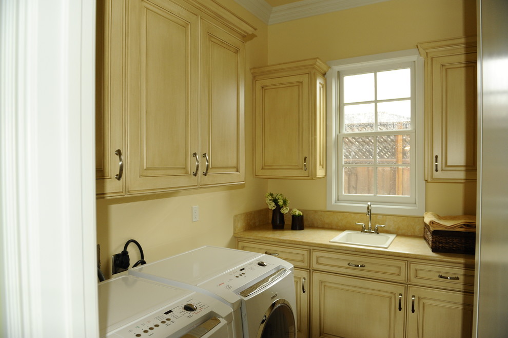 Inspiration for a transitional laundry room remodel in San Francisco