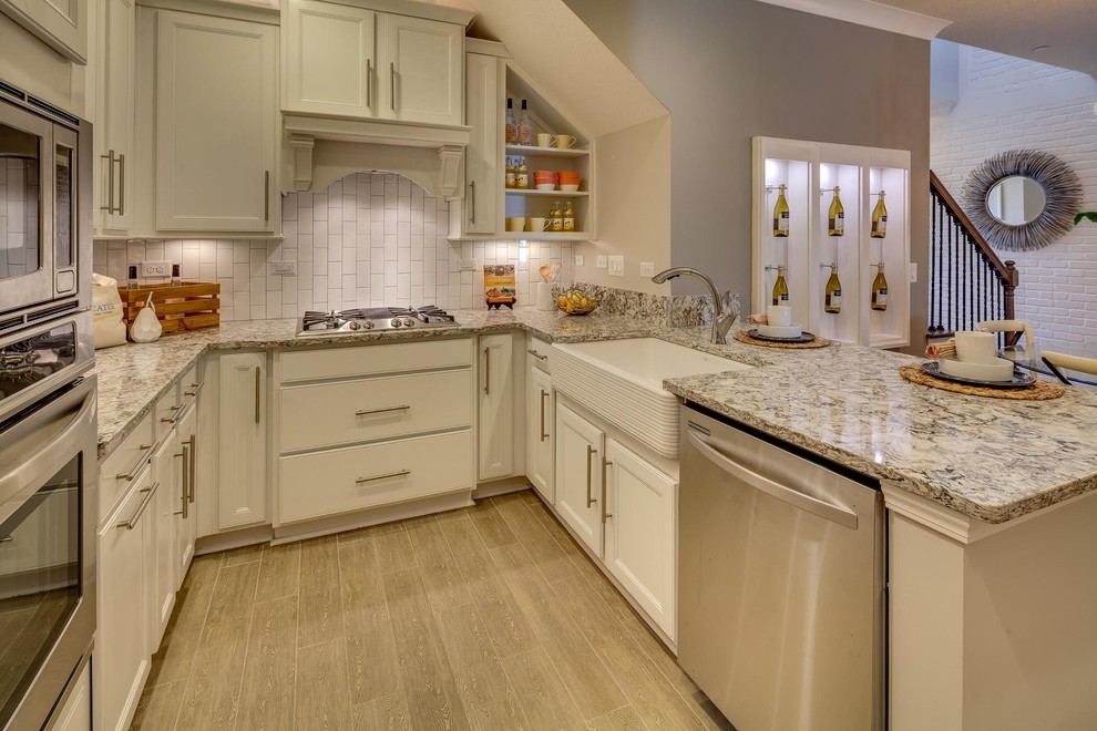 Example of a transitional kitchen design in Miami