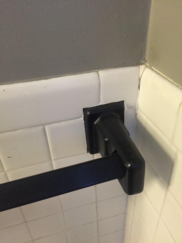 Trying to remove old towel bars without damaging surrounding tile