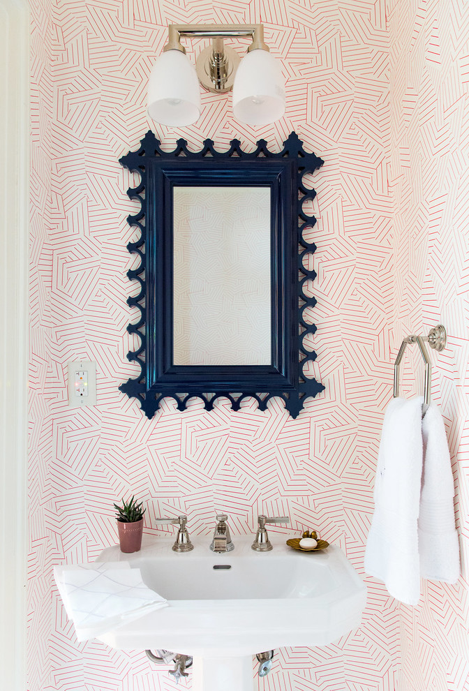 Eclectic powder room in Raleigh with multi-coloured walls and a pedestal sink.