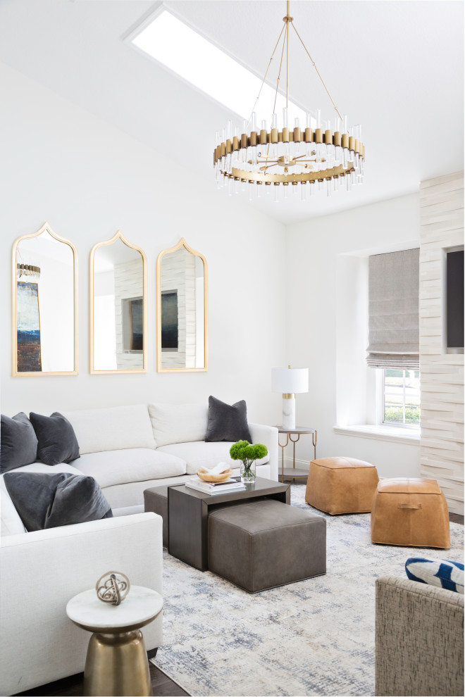 Inspiration for a transitional living room in Tampa with white walls, dark hardwood floors, a wall-mounted tv and brown floor.