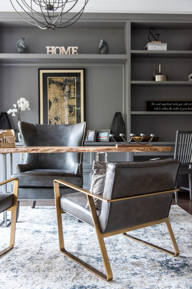 Example of a transitional home design design in Toronto
