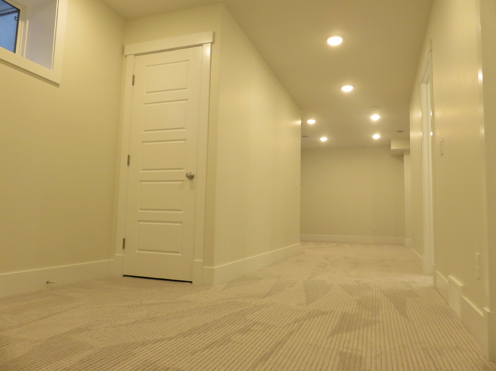 Home design - mid-sized transitional home design idea in Calgary