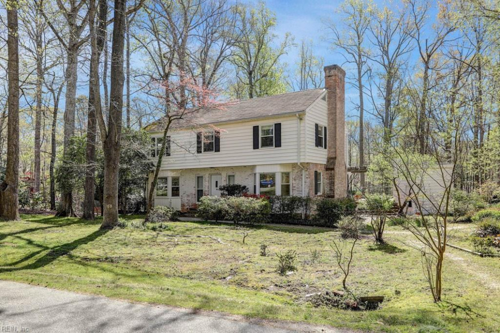 How would you improve the exterior of this Garrison Colonial?