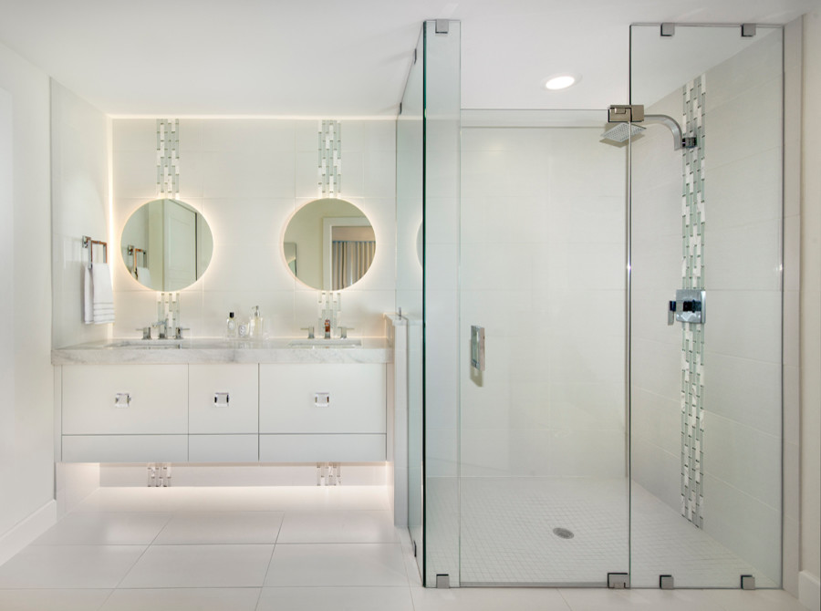 Design ideas for a mid-sized contemporary master bathroom in Miami with flat-panel cabinets, white cabinets, a curbless shower, white tile, porcelain tile, white walls, porcelain floors, an undermount sink, white floor, a hinged shower door and engineered quartz benchtops.