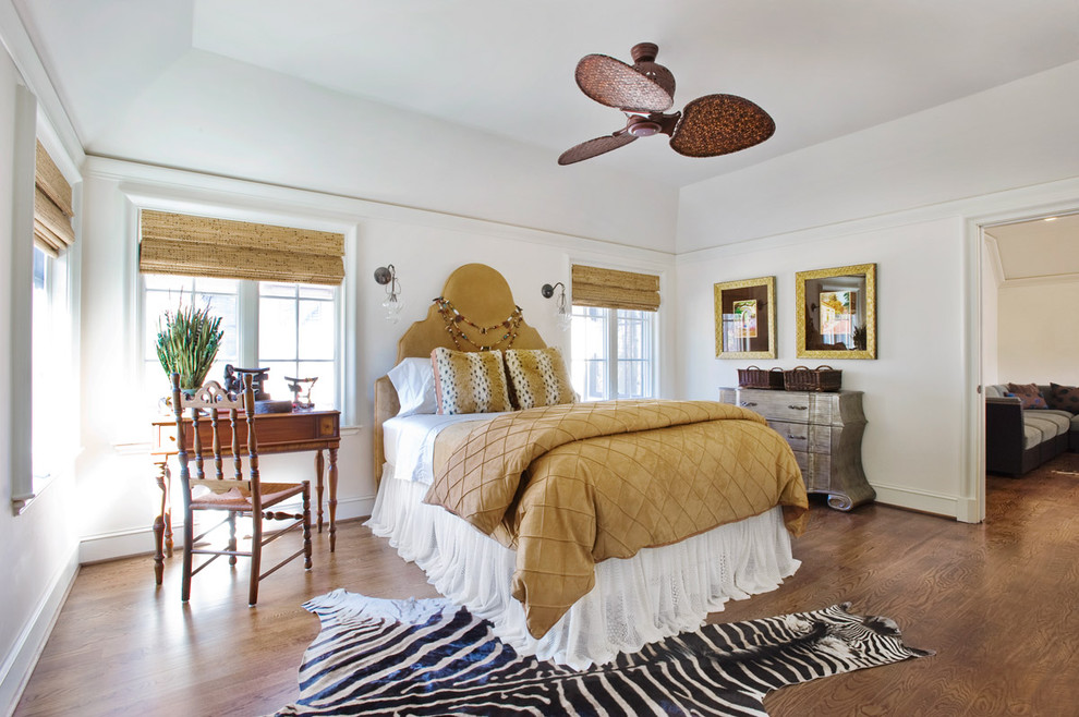 This is an example of an eclectic guest bedroom in Other with white walls, dark hardwood floors, no fireplace and brown floor.