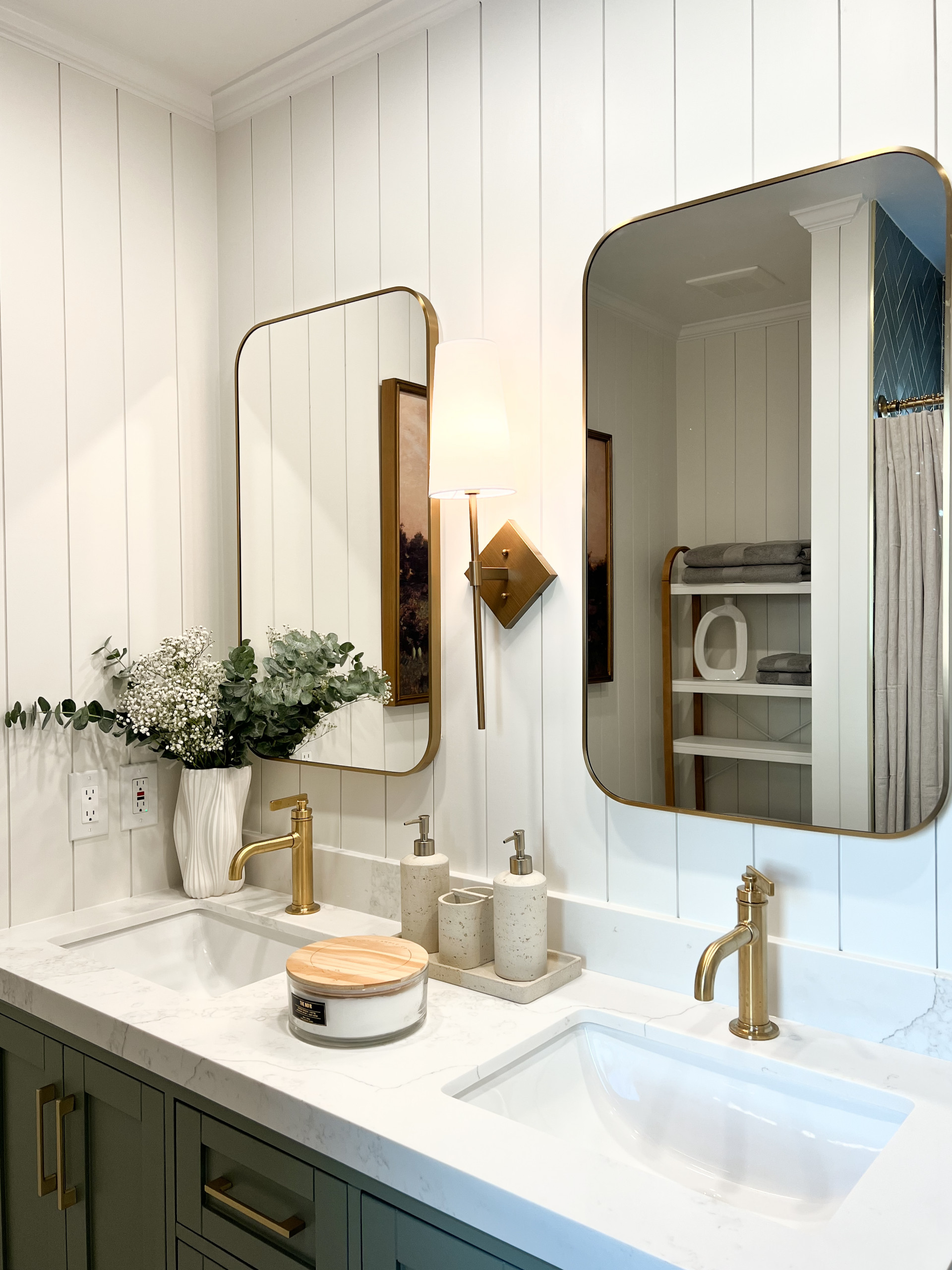 Transitional Primary Bathroom Renovation with herringbone ribbed tile, double vanity sink, and checkered flooring.